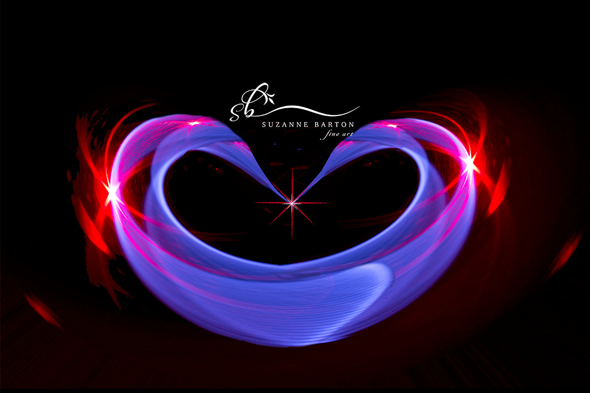 This Alice in Wonderland light trail -"Queen of Hearts" is swirling light trails create a sense of movement and energy, giving the images a lively, positive feel.