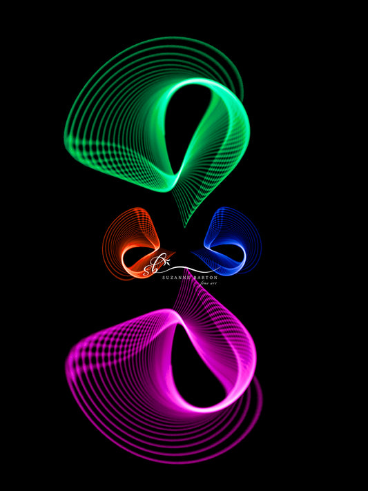 Fine Art Photograph of abstract light in a stacked design of green, bright pink, blue and red.