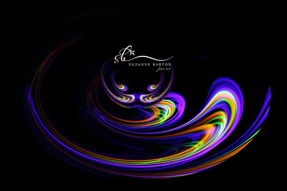 Colorful light trails create an image that looks like The Cheshire Cat from Alice in Wonderland. Purple, greens and oranges look vibrant.