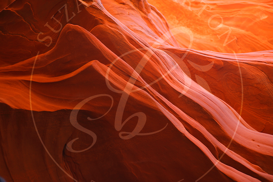 Antelope Canyon and its stunning hues and intricate rock formations in pinks, orange and brown hues. 